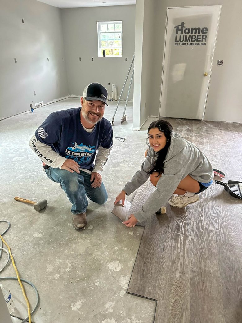 Edie installing flooring