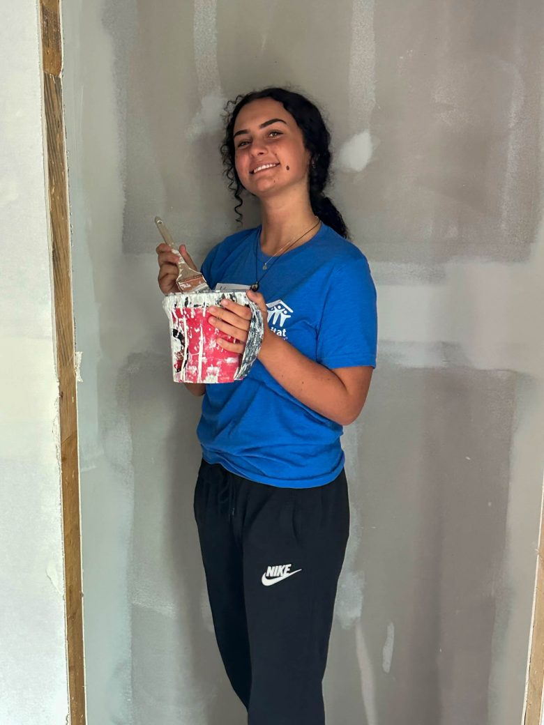 Student with paintbrush
