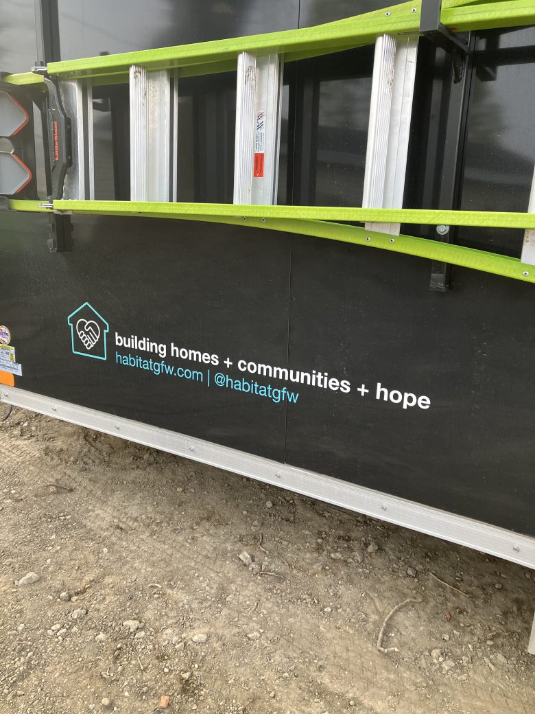 Side of Habitat trailer "Building homes, communities, and hope"