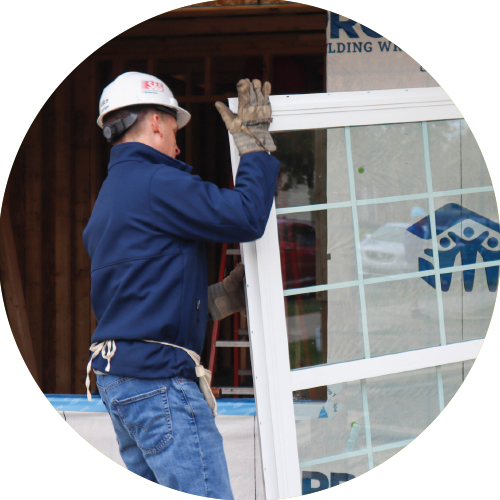 Man carrying window