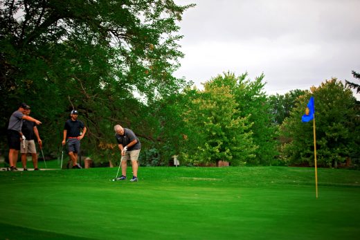 Golf player putting