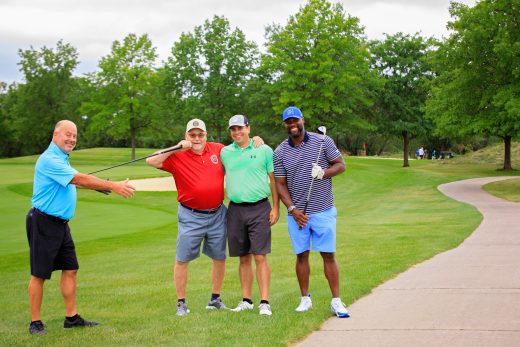 Impact Center group at golf outing being silly