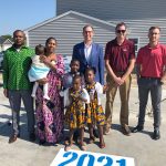 Mimpongo family on driveway