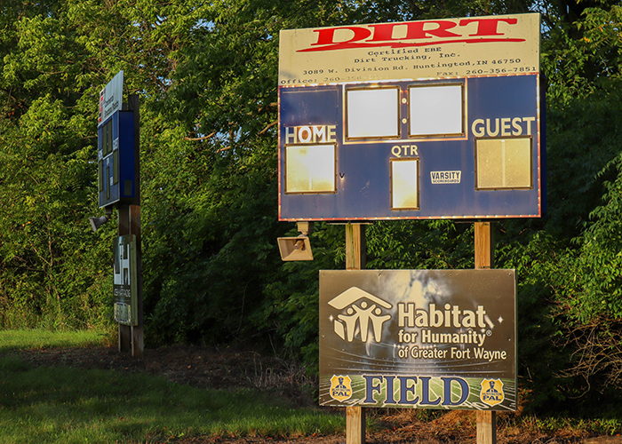 Football score sign with Habitat sponsorship