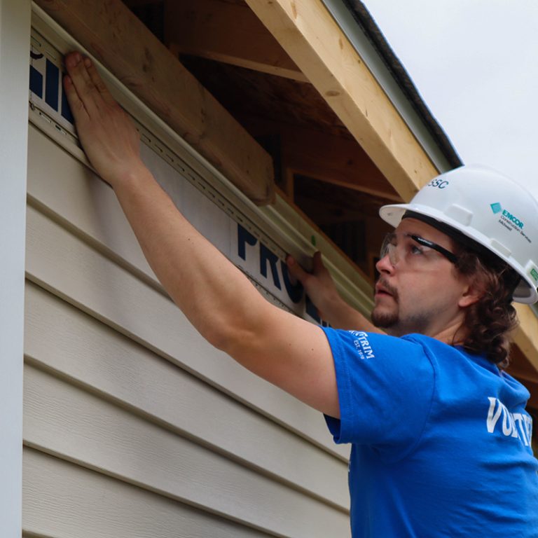 Man installing siding