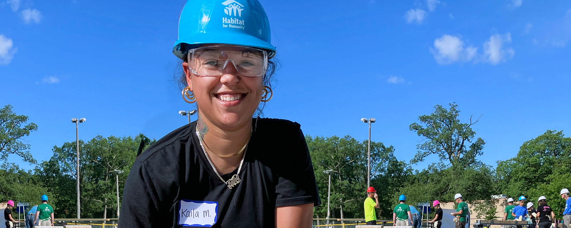 Habitat Volunteer smiling in hard hat