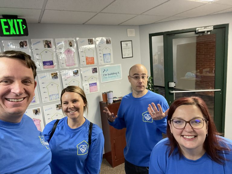 Habitat staff in new shirts