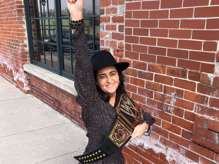 Victoria with championship belt